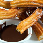 Indulge in Spanish Churros with Rich Dark Chocolate Ganache