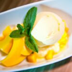 Tropical Bliss: Mango Sorbet with Coconut Foam & Lime Zest