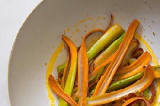 Savor Charred Leeks with Smoky Romesco and Almond Crunch